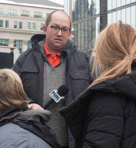 A Fox News person interviews people at the Freedom Convoy in Ottawa