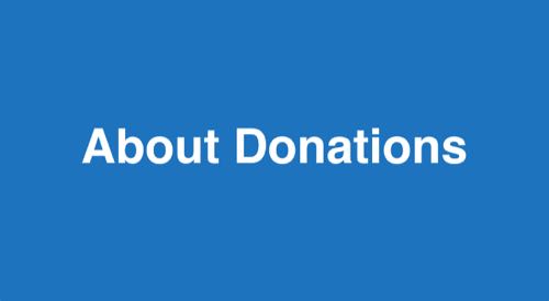 A blue sign with white text saying "About Donations"