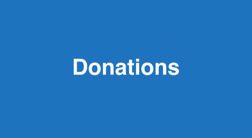 A blue sign saying "Donations"